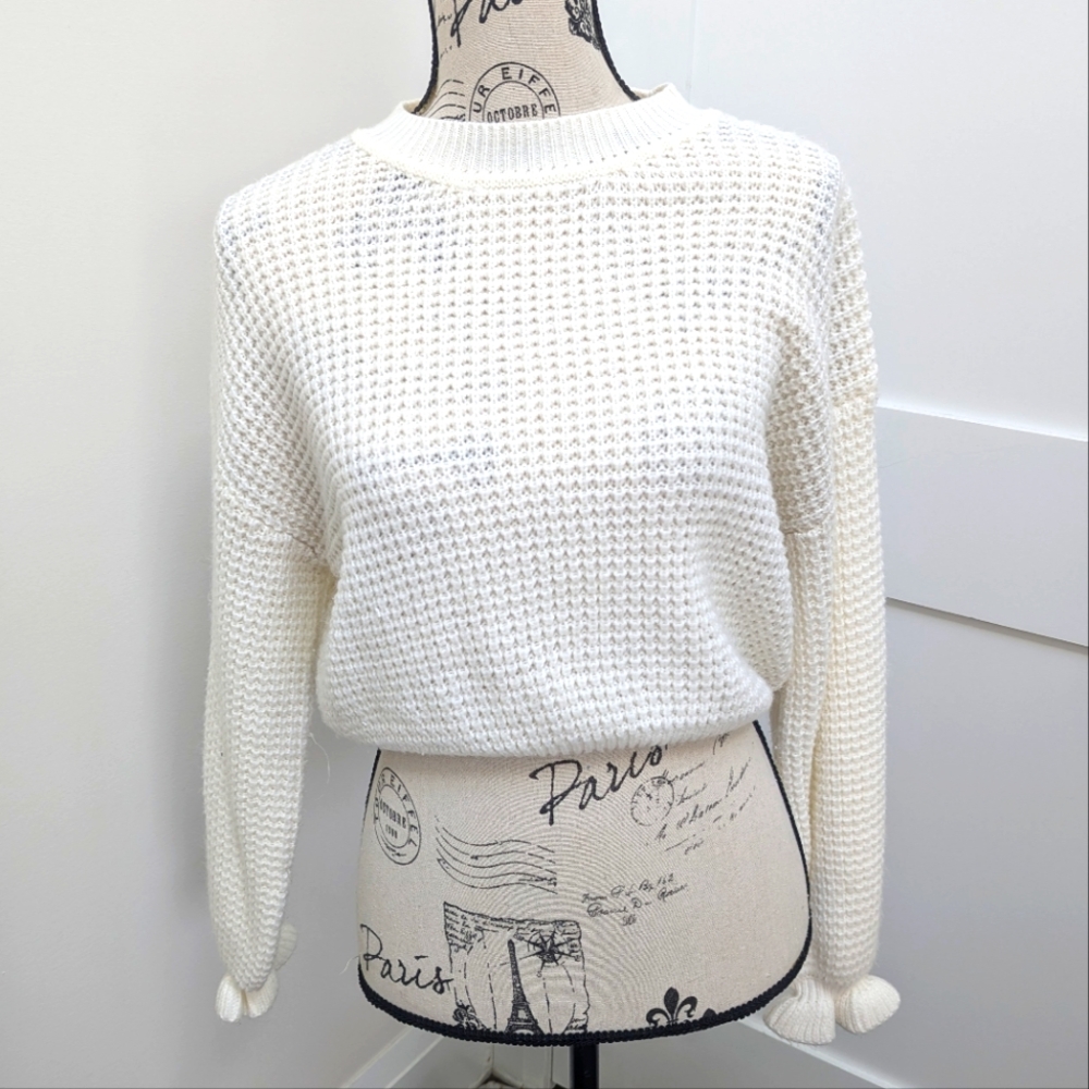 H&M soft white sweater with ruffle wrists